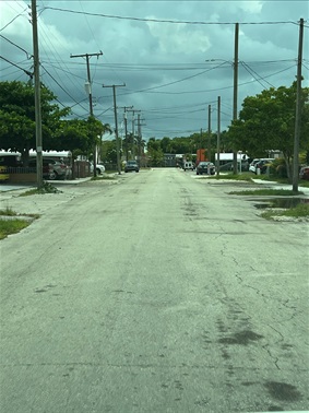 Photo of SW 25 Street roadway I need of repair